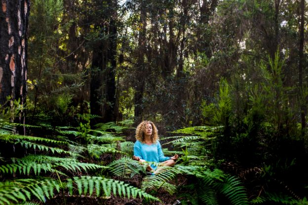 Beautiful adult lady do mindfulness exercises and yoga